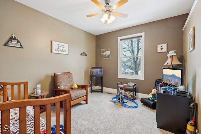 carpeted bedroom featuring baseboards