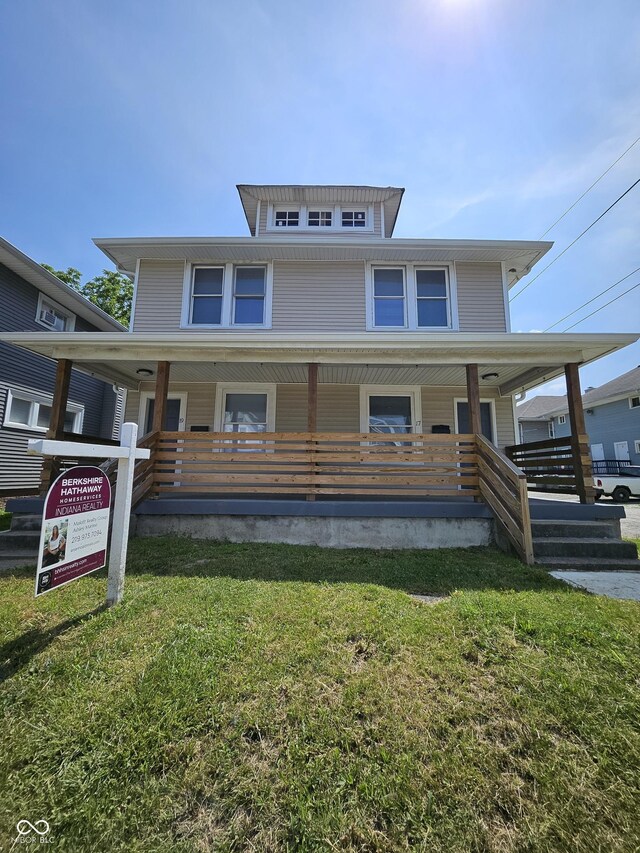 17 Parkview Ave, Indianapolis, IN 46201 - american foursquare style home with covered porch and a front lawn