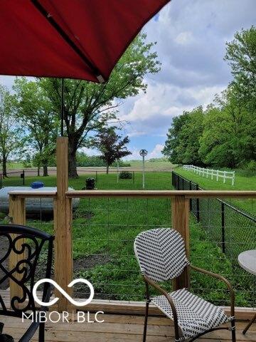 wooden balcony featuring a deck