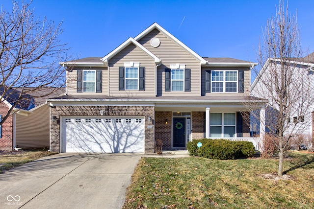 front of property featuring a garage and a front yard