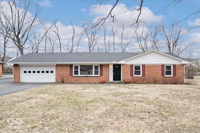 ranch-style home featuring a shingled roof, aphalt driveway, crawl space, an attached garage, and brick siding