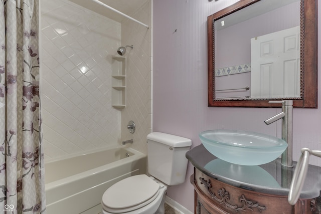 full bathroom featuring vanity, toilet, and shower / bath combo with shower curtain