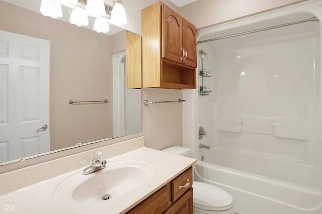 full bath with toilet, vanity, and bathing tub / shower combination