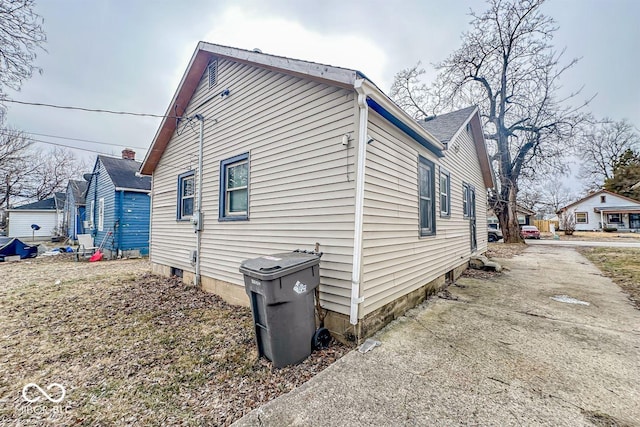 view of property exterior featuring a residential view