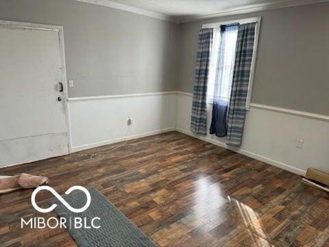 314 E Barachel Ln, Greensburg, IN 47240 - unfurnished room featuring crown molding and dark wood finished floors