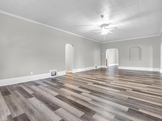 unfurnished living room with ceiling fan, light wood-type flooring, and crown molding