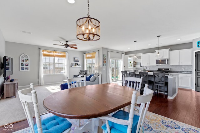 dining room with recessed lighting, baseboards, dark wood-type flooring, and ceiling fan