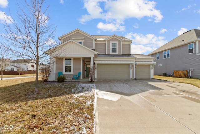 view of front of property with an attached garage and concrete driveway