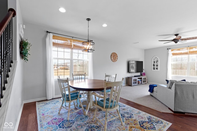 dining room featuring a wealth of natural light, wood finished floors, recessed lighting, and ceiling fan with notable chandelier