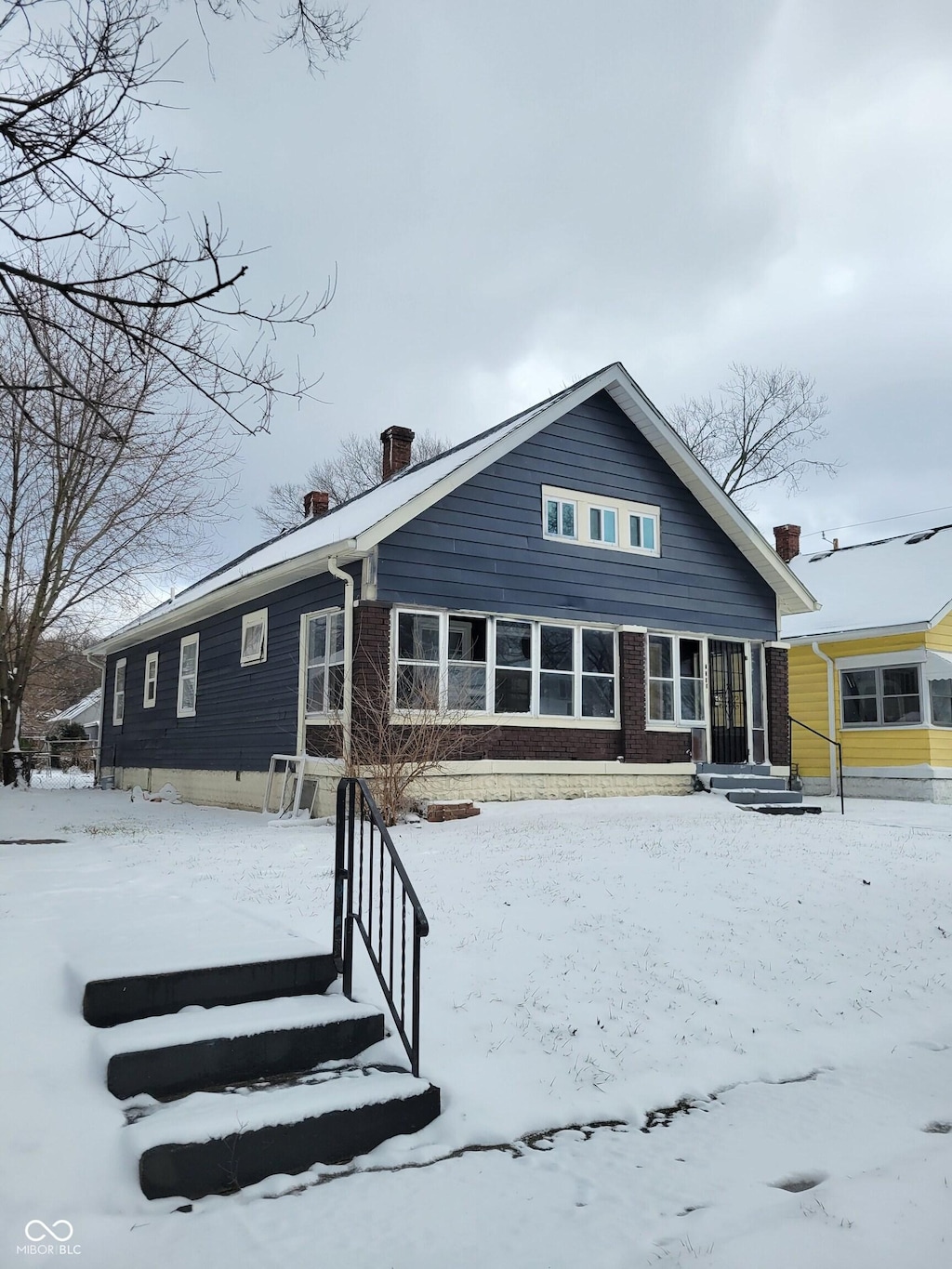 2309 N Dearborn St, Indianapolis, IN 46218 - view of snow covered back of property