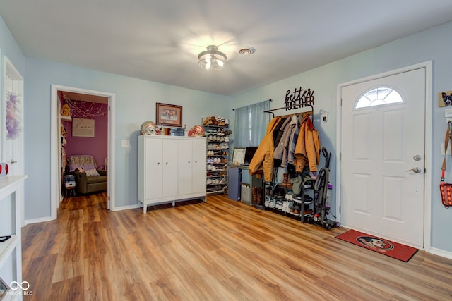 entrance foyer with light wood-type flooring