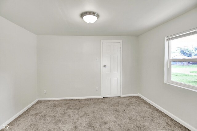 952 N Concord St, Indianapolis, IN 46222 - carpeted empty room with baseboards