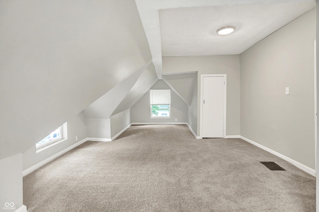 952 N Concord St, Indianapolis, IN 46222 - bonus room with carpet flooring and vaulted ceiling