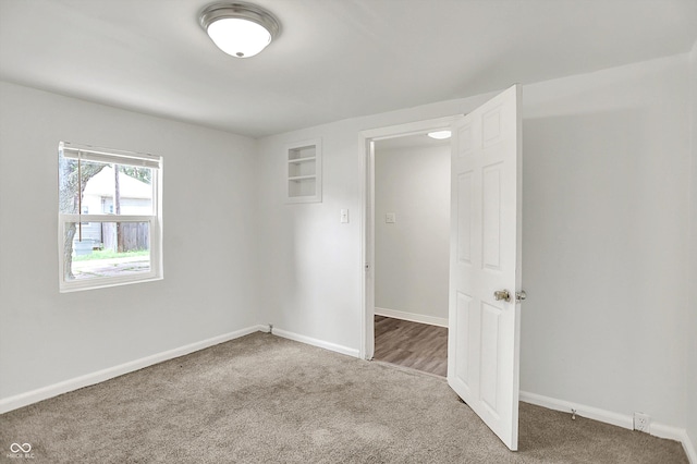 952 N Concord St, Indianapolis, IN 46222 - unfurnished bedroom featuring carpet flooring and baseboards