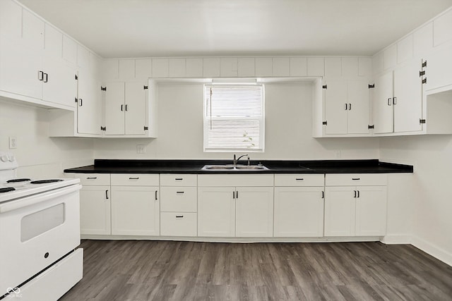 952 N Concord St, Indianapolis, IN 46222 - kitchen with white electric range, white cabinetry, dark wood-style floors, and dark countertops