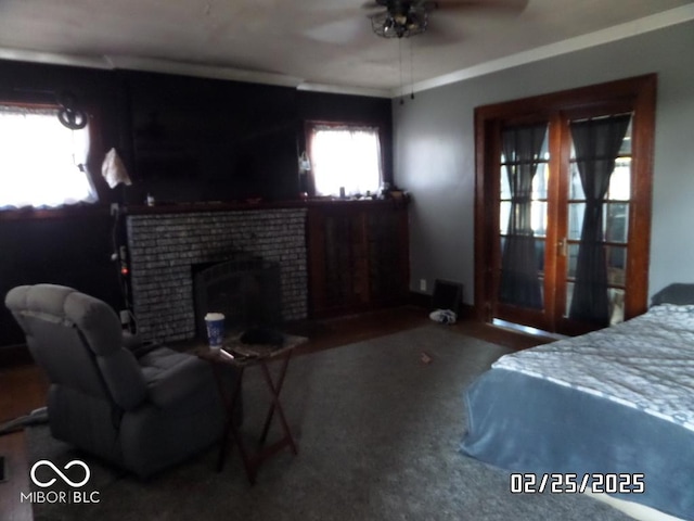 carpeted bedroom with a brick fireplace