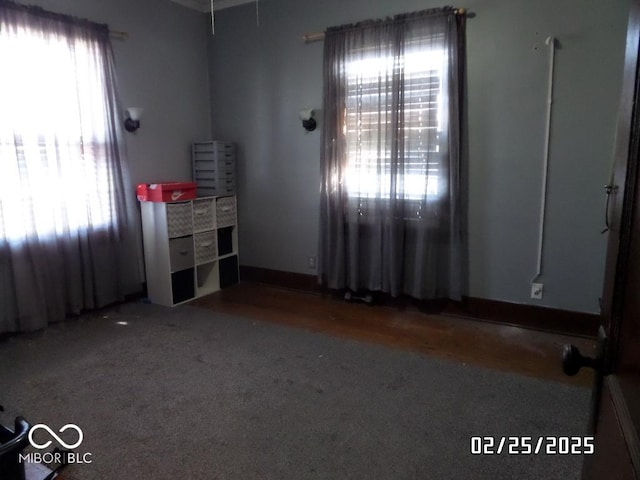 unfurnished bedroom featuring baseboards