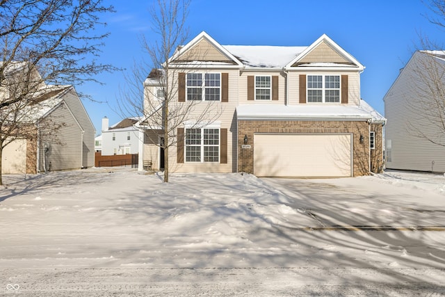 view of front of home with a garage