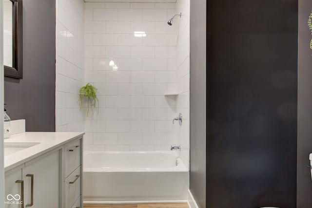 bathroom featuring shower / bath combination and vanity