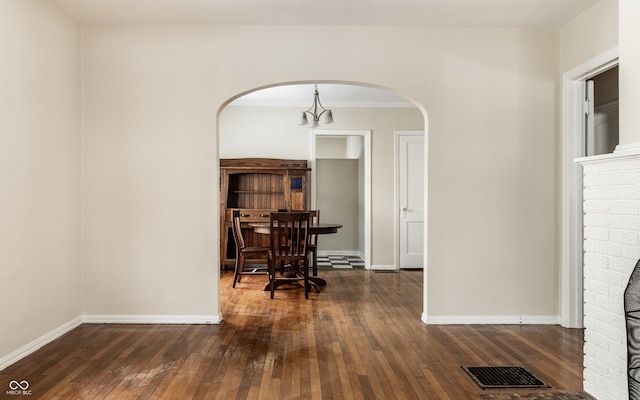 dining space featuring dark wood-type flooring