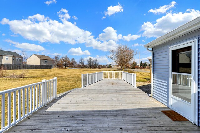 wooden deck with a yard