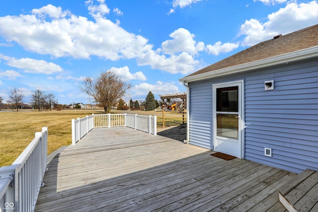 wooden deck with a yard