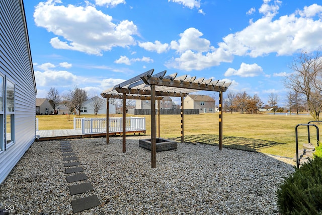 view of yard with a residential view and a pergola