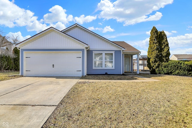 ranch-style house featuring a garage, concrete driveway, and a front yard