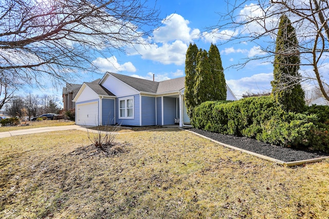 exterior space with a garage and driveway