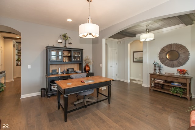 dining space featuring arched walkways, dark wood-style floors, beamed ceiling, and baseboards