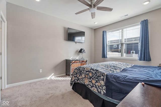 carpeted bedroom featuring baseboards, visible vents, ceiling fan, and recessed lighting