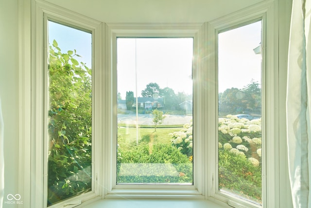 doorway to outside featuring a wealth of natural light