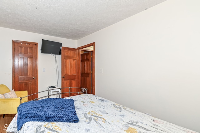 bedroom with a textured ceiling