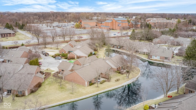 aerial view featuring a residential view and a water view