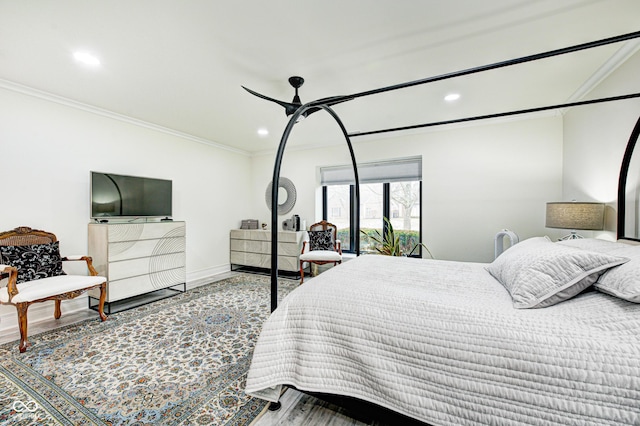 bedroom with access to outside, recessed lighting, and crown molding