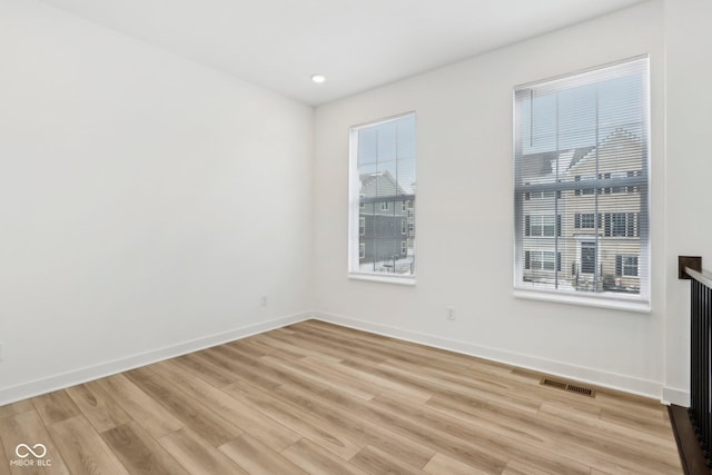 empty room featuring light hardwood / wood-style flooring