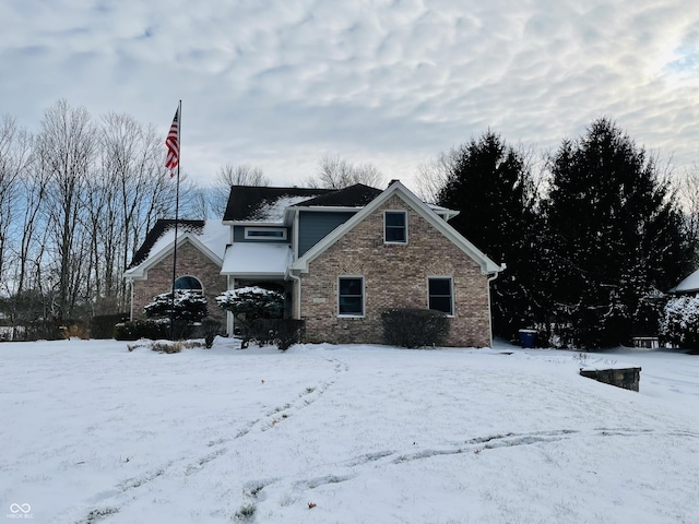 view of snow covered property