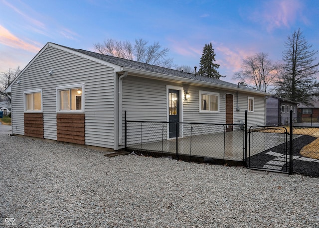 exterior space featuring a gate and fence