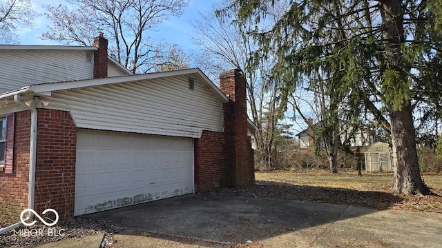 view of property exterior featuring a garage