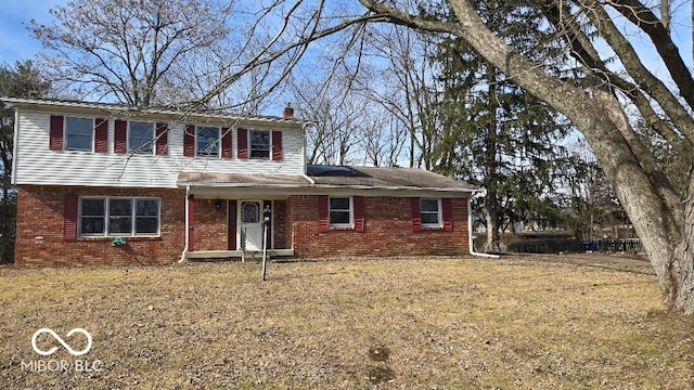 view of front property featuring a front yard