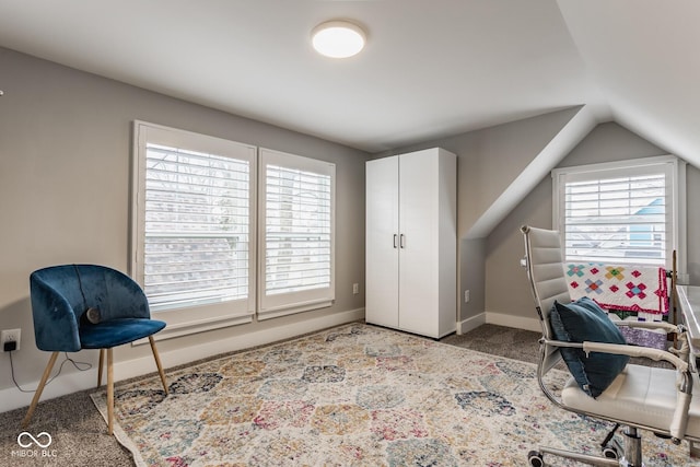 office area with lofted ceiling, carpet flooring, and baseboards