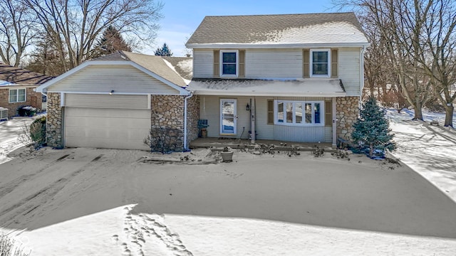 traditional home with a garage, stone siding, and a shingled roof