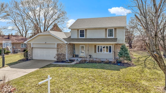 traditional-style house featuring stone siding, an attached garage, and a front yard