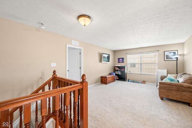 interior space featuring a textured ceiling