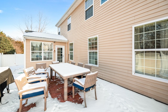 view of snow covered patio