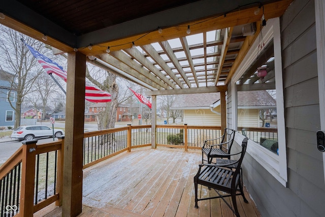 wooden deck with a pergola