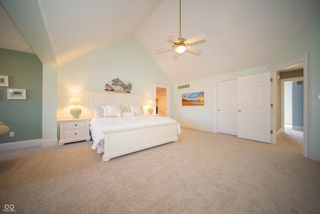 bedroom with visible vents, baseboards, high vaulted ceiling, and carpet flooring