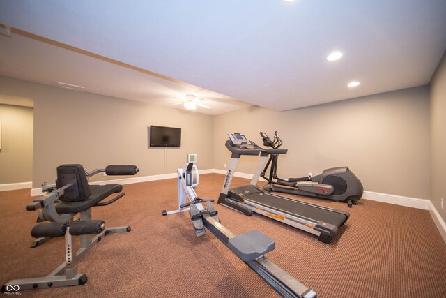 workout area featuring recessed lighting and baseboards