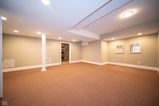 finished below grade area with recessed lighting, baseboards, and visible vents