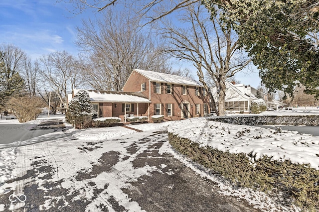 view of snow covered property